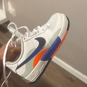 Nike Kids White and Blue Sneakers with Orange Accents